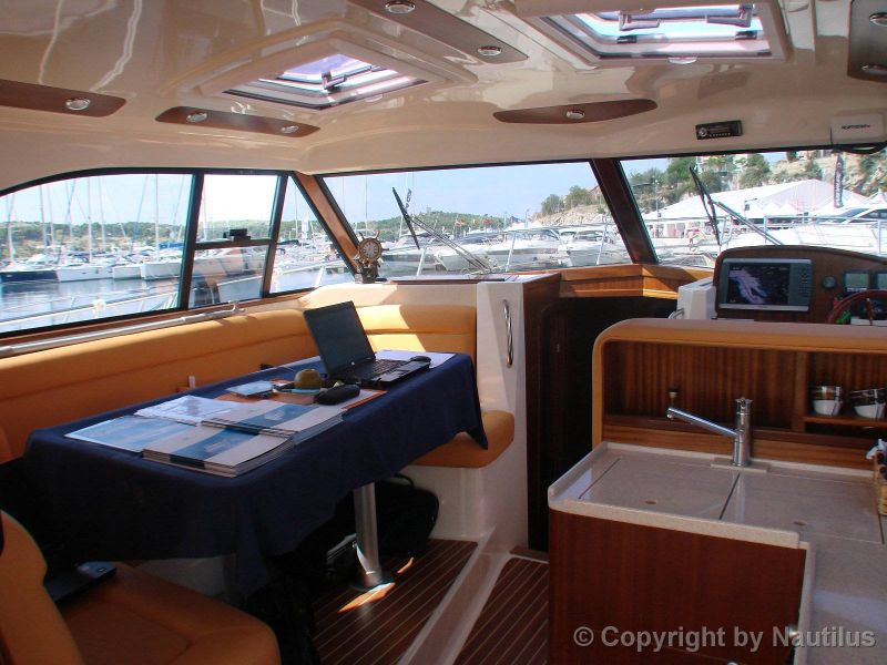 Rent a boat, Adriana 44, table in saloon
