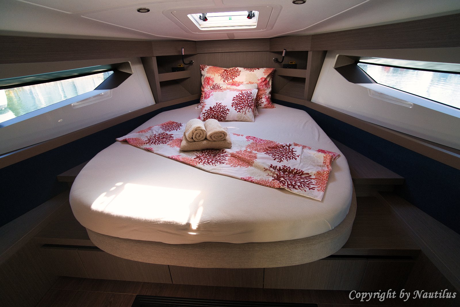 Beneteau Gran Turismo 41 'Miami Vice' - Master Cabin The spacious forward owner's cabin on 'Miami Vice' features a central island bed and hull windows.