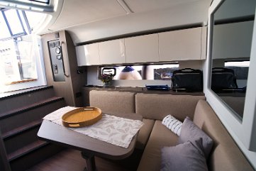 Salon & Master Entry - GT 41 The open layout connects the salon seamlessly with the forward master cabin on 'Miami Vice'.