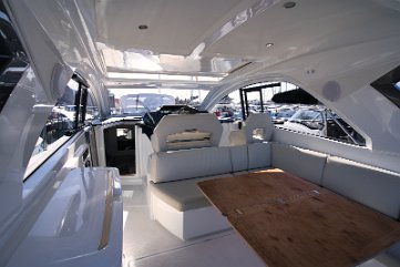 Salon & Cockpit Table - Gran Turismo 41 The heart of 'Miami Vice': a spacious U-shaped lounge under the opening hardtop.