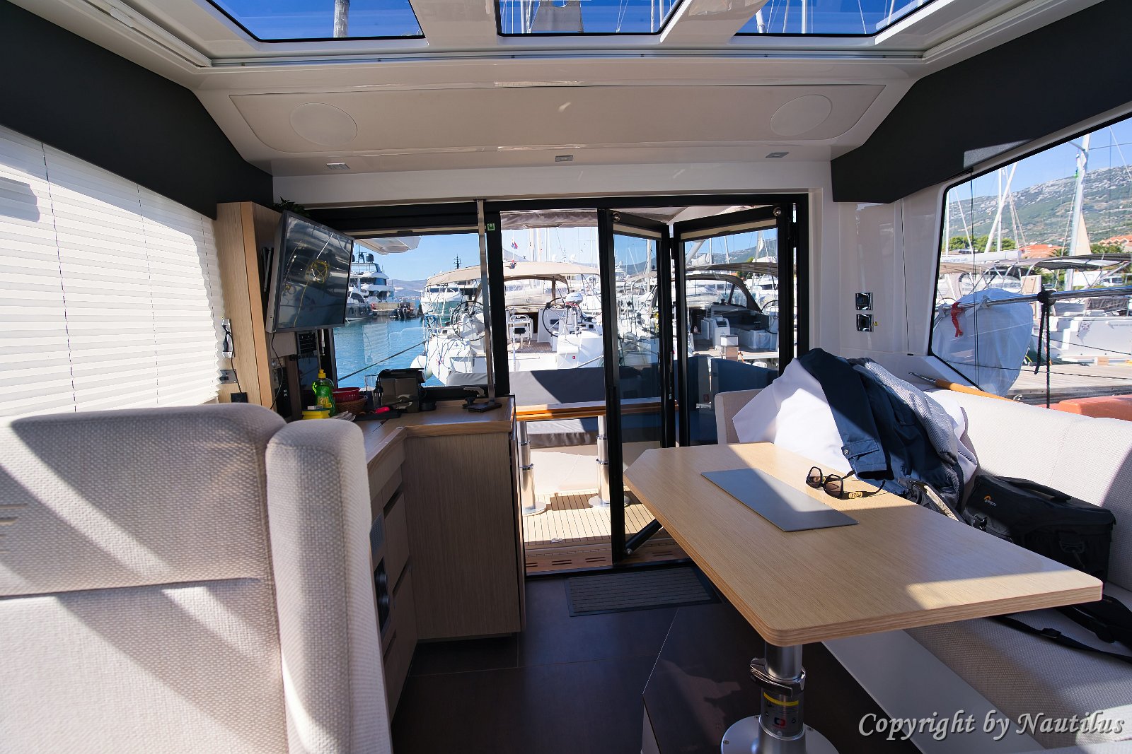 Bright Salon Sealine C390 'Tireless' 360-degree panoramic views make the salon of 'Tireless' feel connected to the sea.