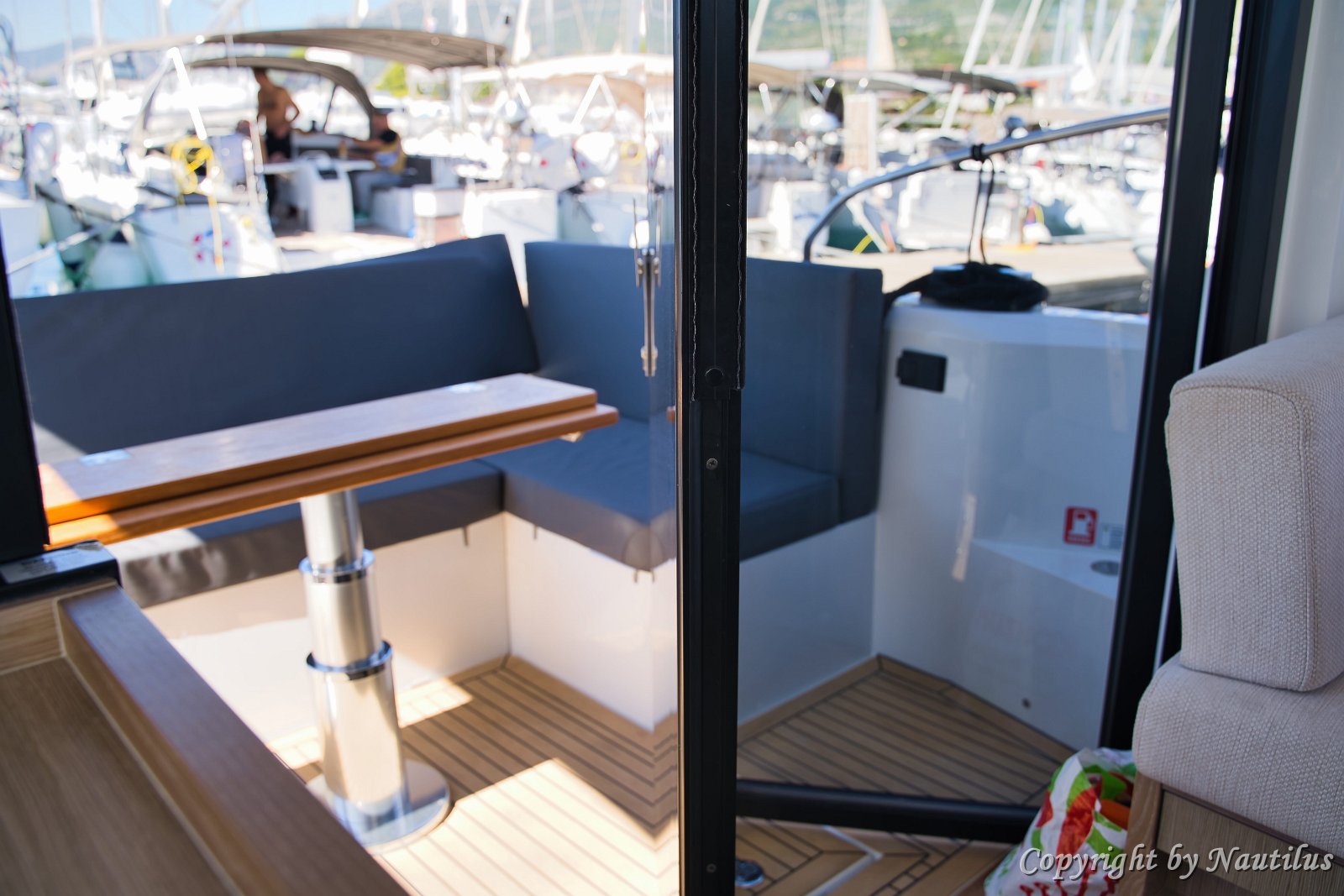 Social Space on Board The salon layout encourages socializing, connecting the helm, galley, and cockpit.