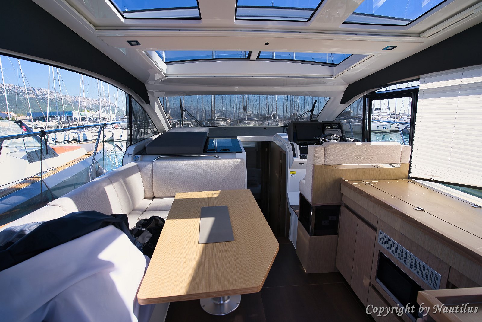 Spacious Living Area Looking forward through the salon, highlighting the open plan and headroom.