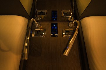 Lighting Details Reading lights and ambient lighting controls conveniently placed at the bedside.