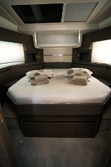 Master Cabin Suite - Sealine F430 Spacious master stateroom with a queen-size island bed and large hull windows on 