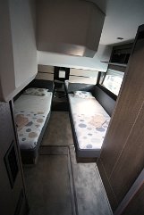 Guest Accommodation Bright and airy twin cabin layout with ample natural light.